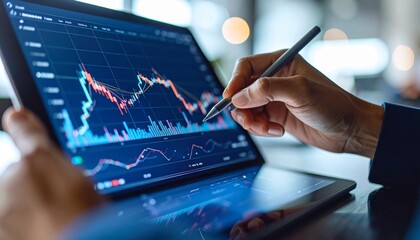 A scene where a stock chart is operated with a stylus pen on a tablet screen