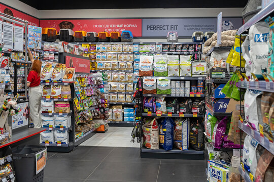 Pet Shop. Animal food. Food for cats and dogs. Shelves with various types of food for pets inside a pet shop. Minsk, Belarus - august 6, 2025