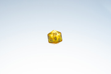 yellow dices for fantasy dnd and rpg tabletop games. Board game polyhedral dices with different sides isolated on white background
