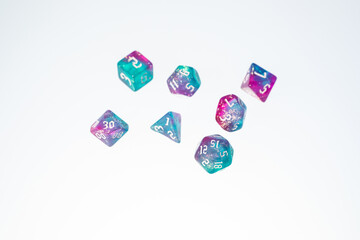 different colours dices for fantasy dnd and rpg tabletop games. Board game polyhedral dices with different sides isolated on white background