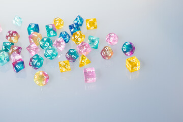 different colours dices for fantasy dnd and rpg tabletop games. Board game polyhedral dices with different sides isolated on white background