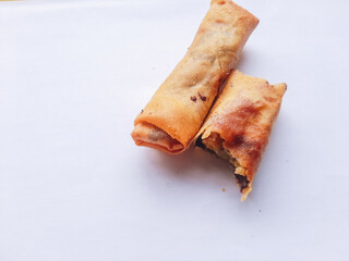 Chocolate bananas, piscok, or caramel bananas are typical Indonesian sweet snacks. Made from banana slices with chocolate or cheese, wrapped in spring roll skin