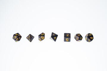 black dices for fantasy dnd and rpg tabletop games. Board game polyhedral dices with different sides isolated on white background