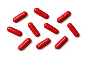 Red pills arranged on transparent background forming diagonal lines