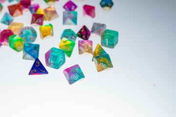 different colours dices for fantasy dnd and rpg tabletop games. Board game polyhedral dices with different sides isolated on white background