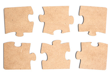 Collection of various pieces of puzzle on white background.