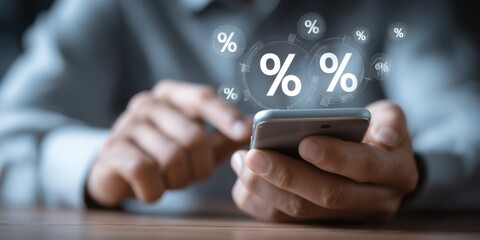 Individual analyzing financial data on mobile device with percentage graphics overlay in a modern setting