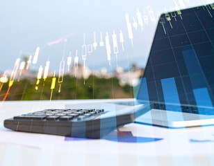 Global financial growth concept, a business graph on a calculator with a city skyline and solar panels on buildings