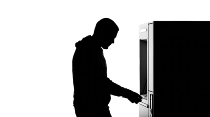 Atm transaction by silhouette figure in urban environment night, isolated on transparent background, png