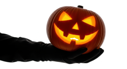 A carved jack-o'-lantern, illuminated from within, held by a gloved hand against a white background.