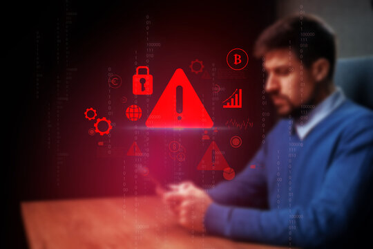 Alert signals and digital security threats with a focused individual using a smartphone in a modern workspace