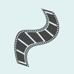 Fototapeta premium A stylized filmstrip curves displaying frames and sprocket holes.