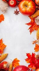 Top view autumn background with apples, leaves and corn framing empty white space, thanksgiving food banner with copy space