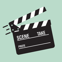 A film clapperboard with white and black stripes is open showing scene and take information.