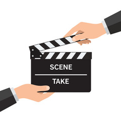 Obraz premium Two hands holding a film clapperboard ready for a scene take.