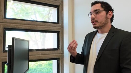 University lecturer utilizes a tablet for digital pedagogy - Powered by Adobe