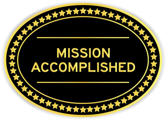 Black and gold color oval label sticker with word mission accomplished on white background