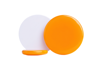 Two round objects, one orange and one white, isolated on transparent background