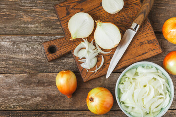 Onion on the kitchen table. onion slice. onion rings. Fresh Yellow Onion. Natural, fresh, vegetarian food. Agricultural products. Healthy eating. Vegetables. Farmer's market. Space for text.Copy space