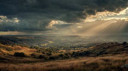 Obraz premium A panoramic view of a hilly landscape stretching towards the horizon under a dramatic sky (2)