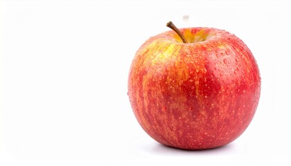 A fresh, ripe red apple covered in glistening water droplets, isolated on a clean white background. Symbol of health, nature, and organic eating.