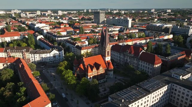 Aerial view of the Coptic Orthodox Church (Koptisch-Orthodoxe Gemeinde) in Berlin, Germany &ndash; distinctive religious architecture and surrounding urban area captured from above . 10 September 2024