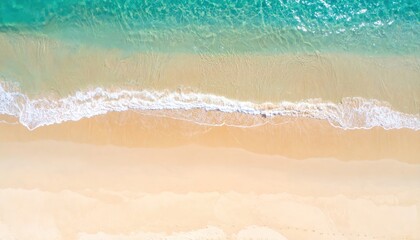 Seashore Serenity: Aerial panorama showcases the meeting of turquoise ocean waves and the golden sands, offering a captivating invitation to serenity.