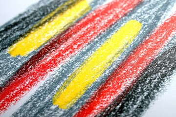 Colorful abstract artwork created with oil pastel on textured paper with vibrant red, yellow, and black strokes