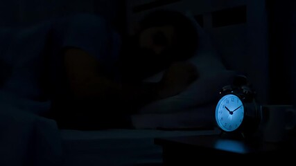 Man In Bed Using Smartphone Next To Alarm Clock At Night Emphasizing Digital Addiction Theme