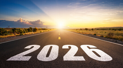 2026 New Year road trip travel and future vision concept . Nature landscape with highway road leading forward to happy new year celebration in the beginning of 2026 for elation and successful start .

