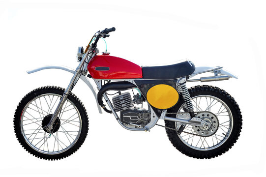 Vintage Fantic Motor Caballero motorcycle for regularity race competitions, isolated on white background, featuring classic frame, rugged tires, and retro racing style.