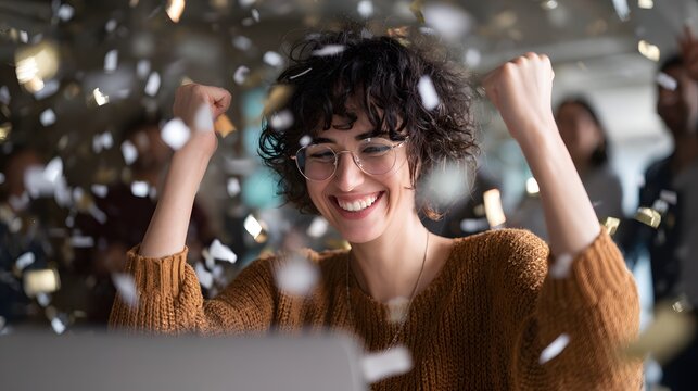 startup entrepreneur launching website on laptop with celebration