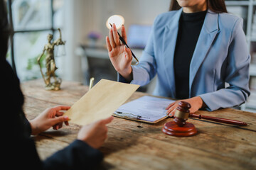 Lawyer refusing bribe offered by client during meeting in office