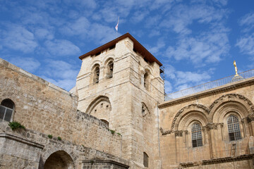Fototapeta premium Exterior view of the stone facade of the Church of the Holy Sepulchre in the Old City of Jerusalem.
