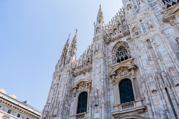 Fototapeta premium Duomo di Milano square in Milan city. Gothic Italian church architecture detail, Italy