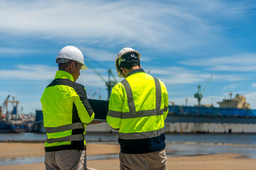 Port engineers are surveying the coastal area to plan for the mooring of cargo ships