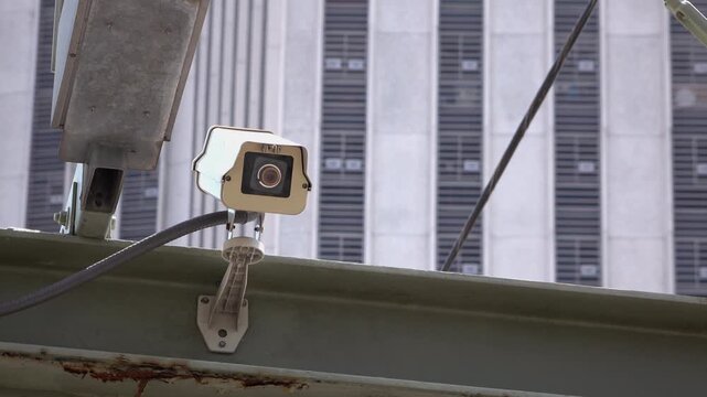 Security camera watching people in city 4k