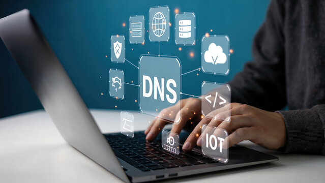 Person managing DNS and IOT with modern laptop, digital security and internet of things concept