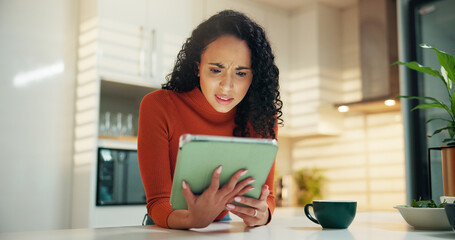 Confused, coffee and tablet with woman in kitchen for reading, social media post and news feed....