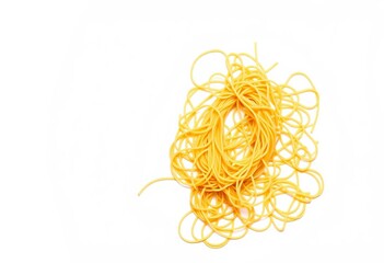 A tangled mass of uncooked spaghetti against a stark white backdrop, golden, top view
