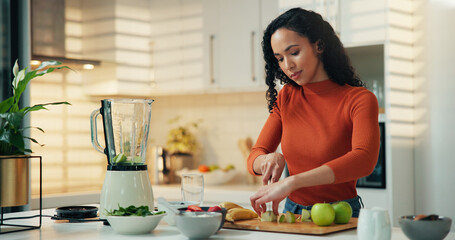 Woman, nutrition and meal prep with blender in kitchen for healthy diet, vitamins or smoothie....