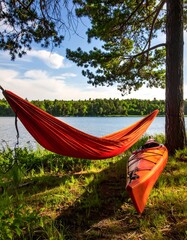 Orange hammock by lake