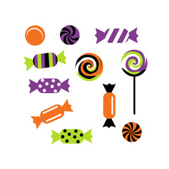 An assortment of Halloween-themed candies and lollipops.