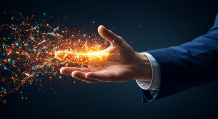 A hand in a suit holds a glowing, fragmented light source, symbolizing power, innovation, or technological advancement against a dark background.