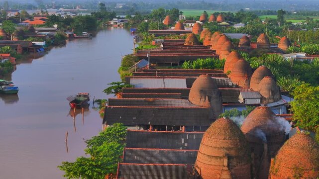 Aerial view of Mang Thit brick kiln in Vinh Long. Burnt clay bricks used in traditional construction of Vietnamese, Mekong Delta, Vinh Long province, Vietnam