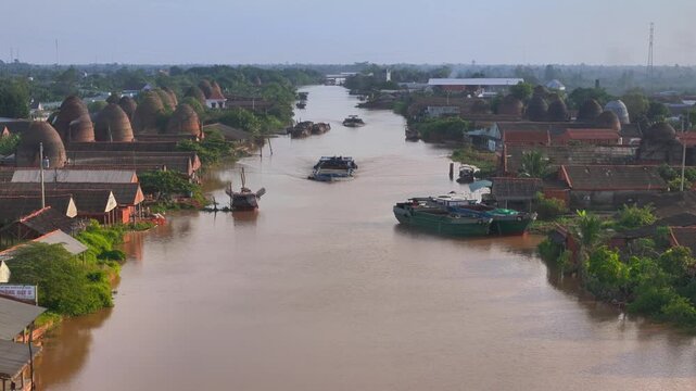 Aerial view of Mang Thit brick kiln in Vinh Long. Burnt clay bricks used in traditional construction of Vietnamese, Mekong Delta, Vinh Long province, Vietnam