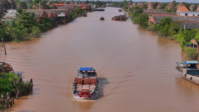 Aerial view of Mang Thit brick kiln in Vinh Long. Burnt clay bricks used in traditional construction of Vietnamese, Mekong Delta, Vinh Long province, Vietnam
