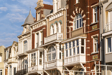 Obraz premium row of ornate historic townhouses with distinct architectural styles. The scene captures the charm of coastal architecture in Dunkirk, France