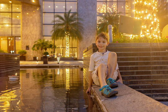 Family with children, boys, visiting Ho Chi Minh city, Saigon, fot a holiday, enjoying asian culture