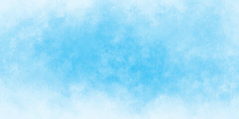 A bright blue sky with wispy white clouds creating a light and airy watercolor background